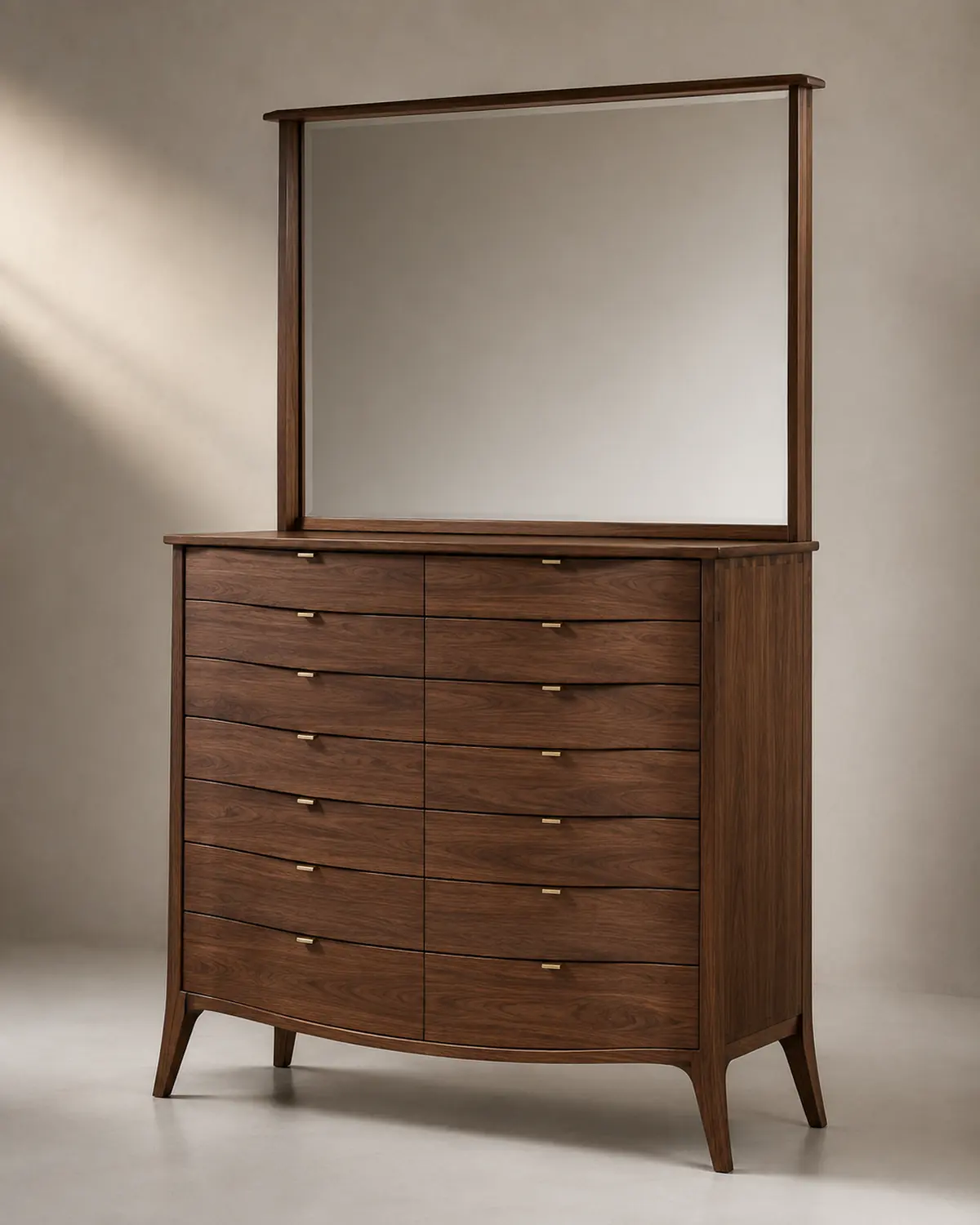 The Darpana Dressing Table, a bow-fronted chest of fourteen drawers in solid timber with a framed mirror above