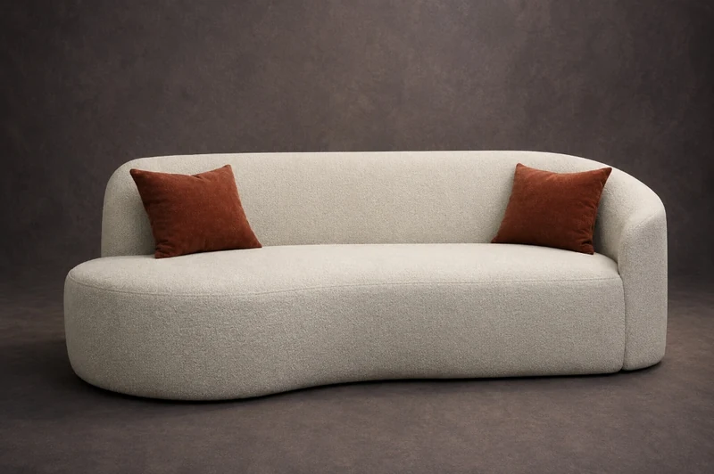 Sola Curved Chaise Sofa in ivory bouclé with terracotta velvet cushions